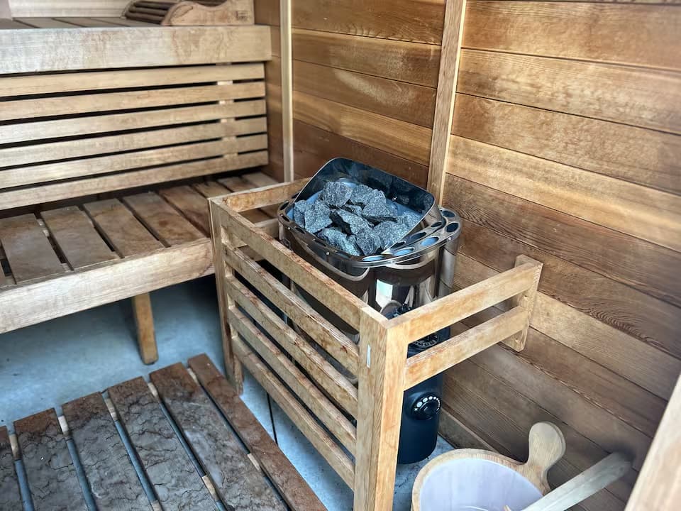 Private sauna with timber benches